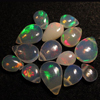 AAAAAA -truly very rare - Ethiopian Opal - really - tope grade high quality smooth polished - pear briolett - huge size - 3.5x5 - 6x9 mm approx 14 pcs - each pcs - have amazing - beautifull - flashy fire all around in the stone approx STUNNING QUALITY - VERY VERY RARE